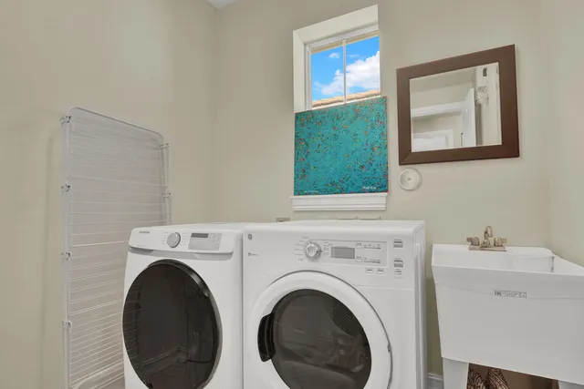a utility room with dryer and washer