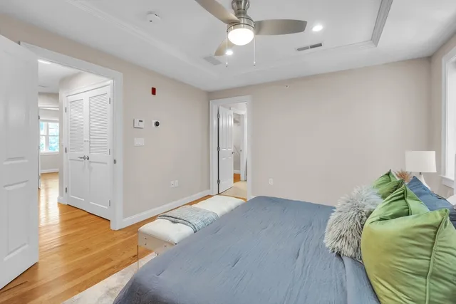 a view of a livingroom with wooden floor