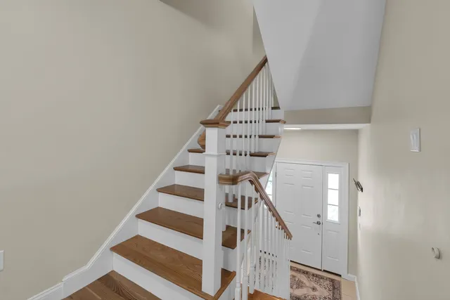 a view of entryway with wooden floor