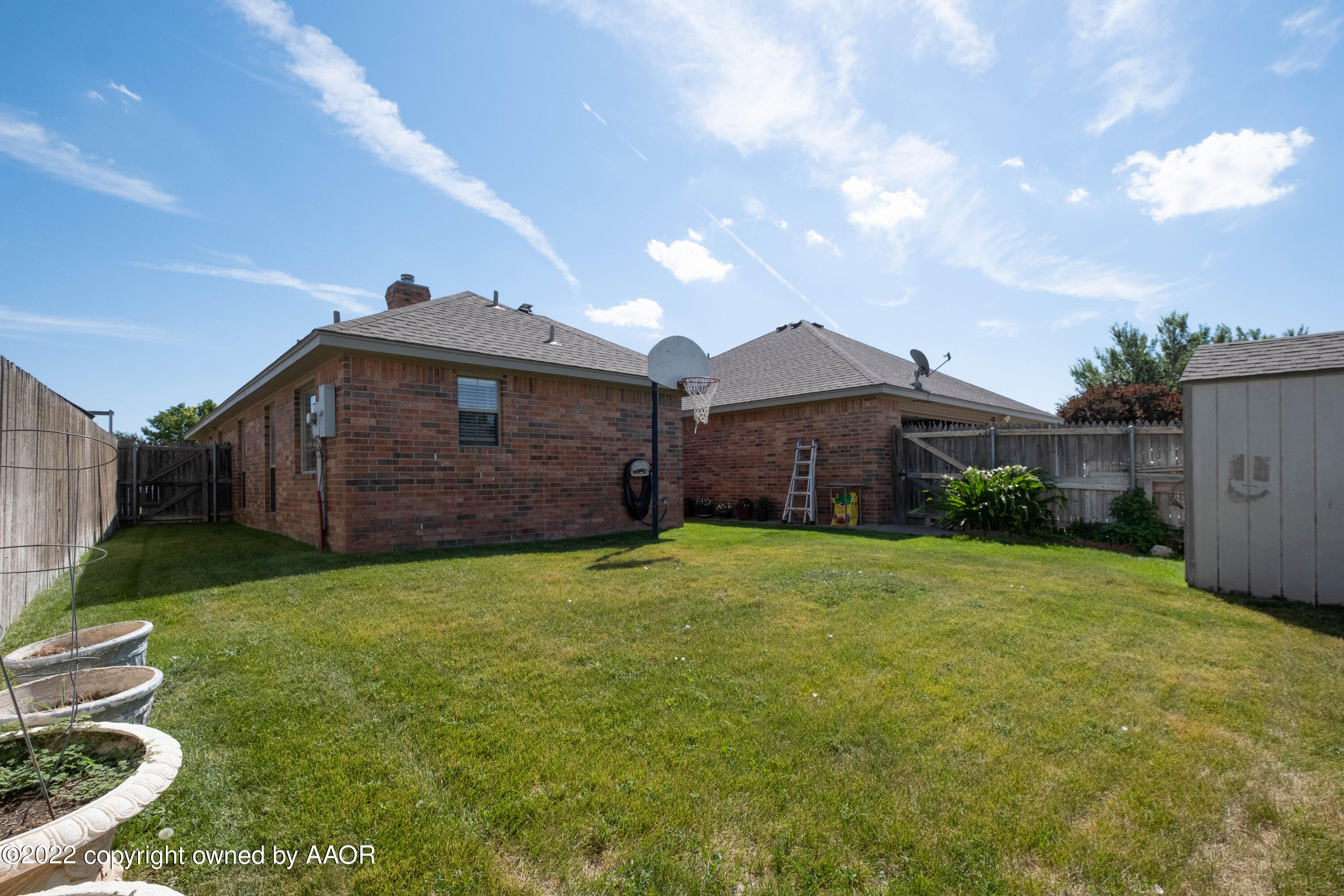 6607 Rally Road Amarillo, TX 79119 - Photo 33 of 34 a house view with a garden space