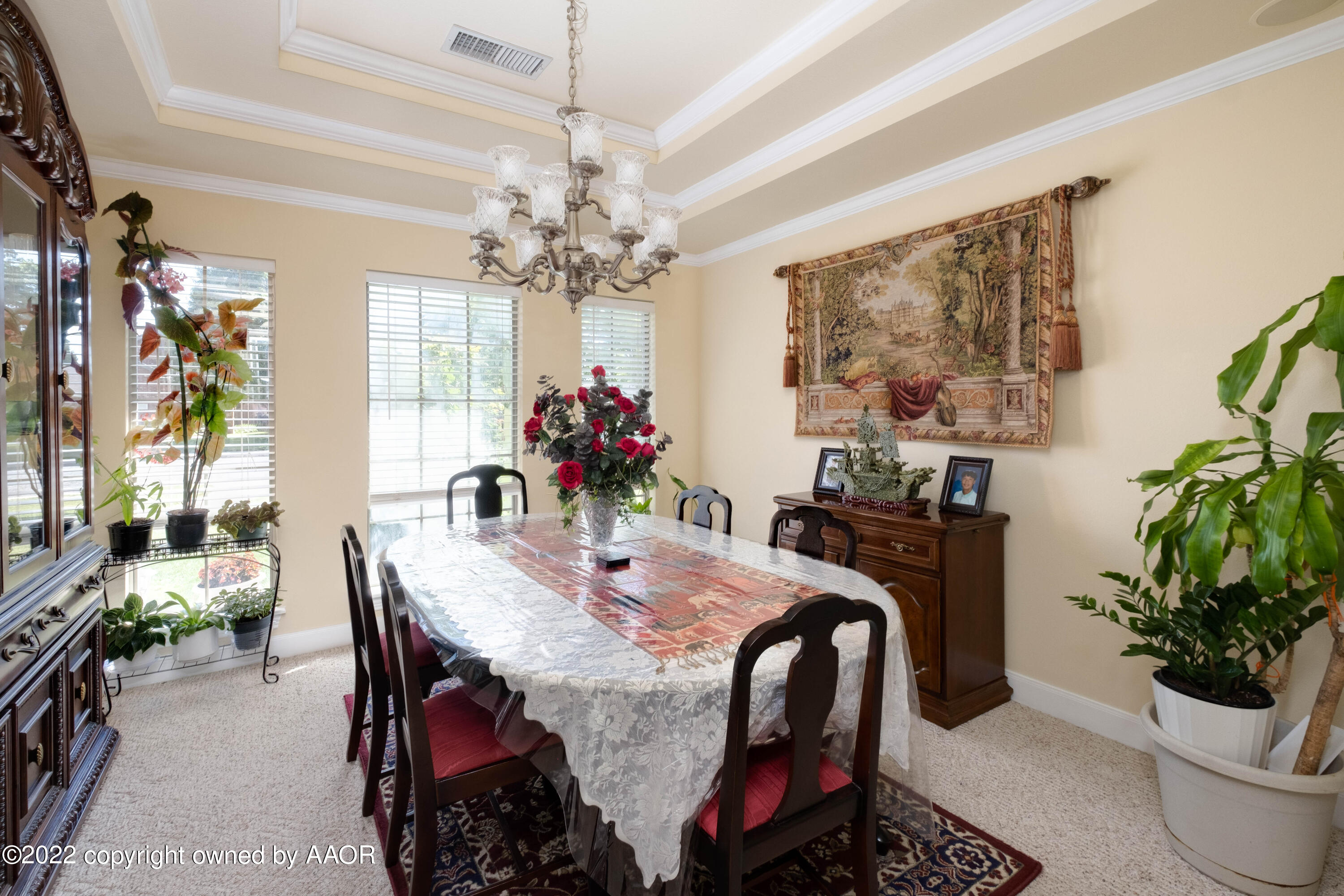 6607 Rally Road Amarillo, TX 79119 - Photo 8 of 34 a view of a dining room with furniture and chandelier