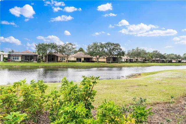a view of a lake with a big yard