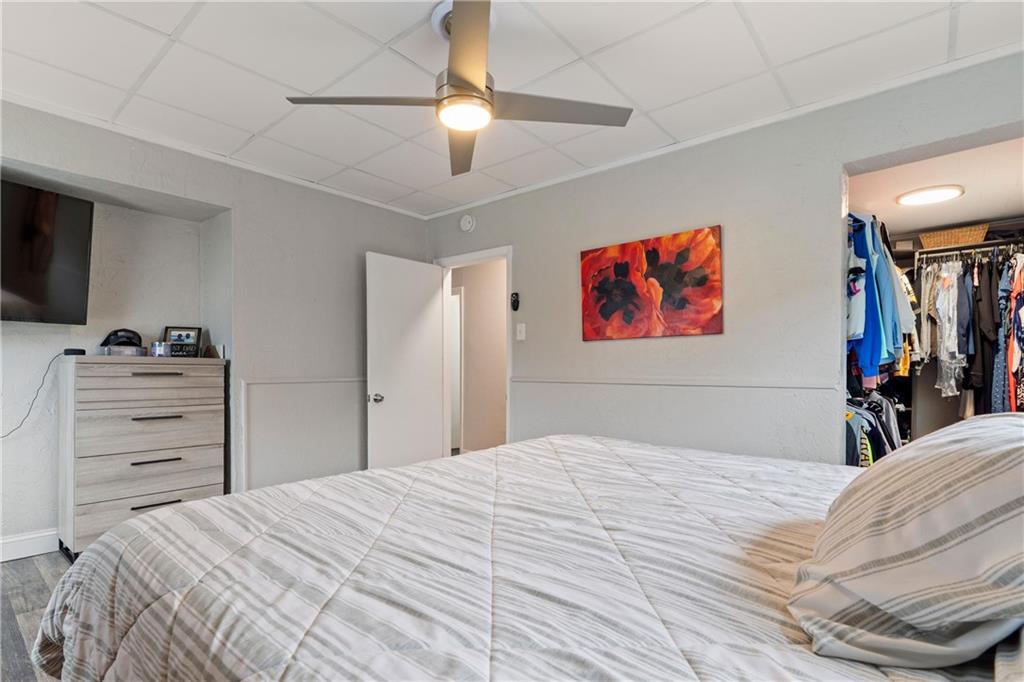 31 Harrison Street Pittsburgh, PA 15205 - Photo 16 of 32 a bedroom with a bed and a flat screen tv