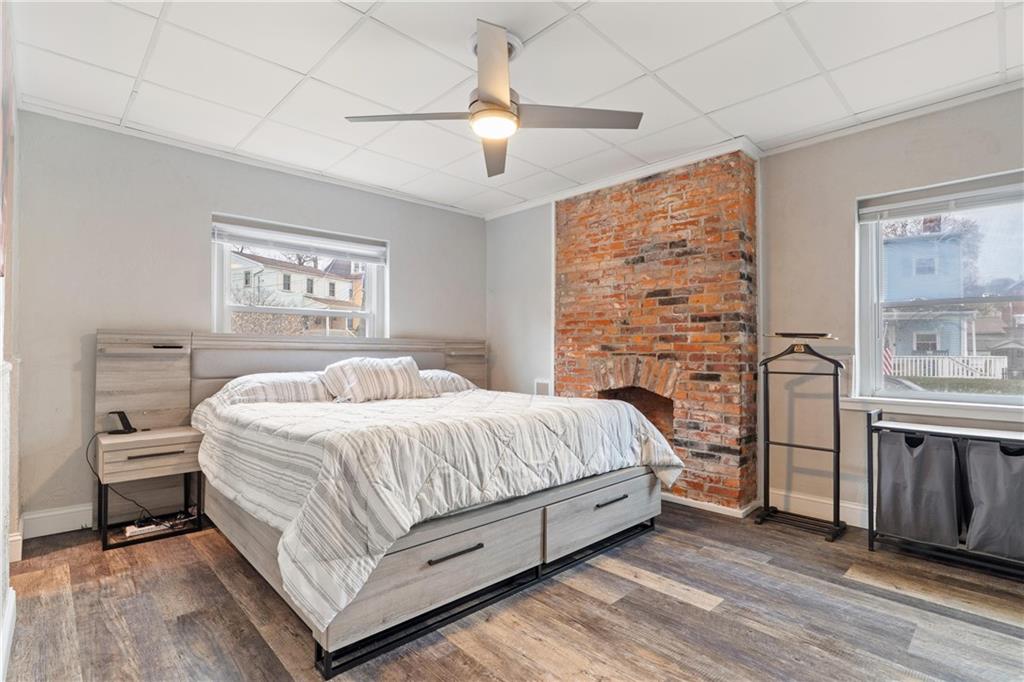 31 Harrison Street Pittsburgh, PA 15205 - Photo 17 of 32 a bedroom with a bed and a flat screen tv