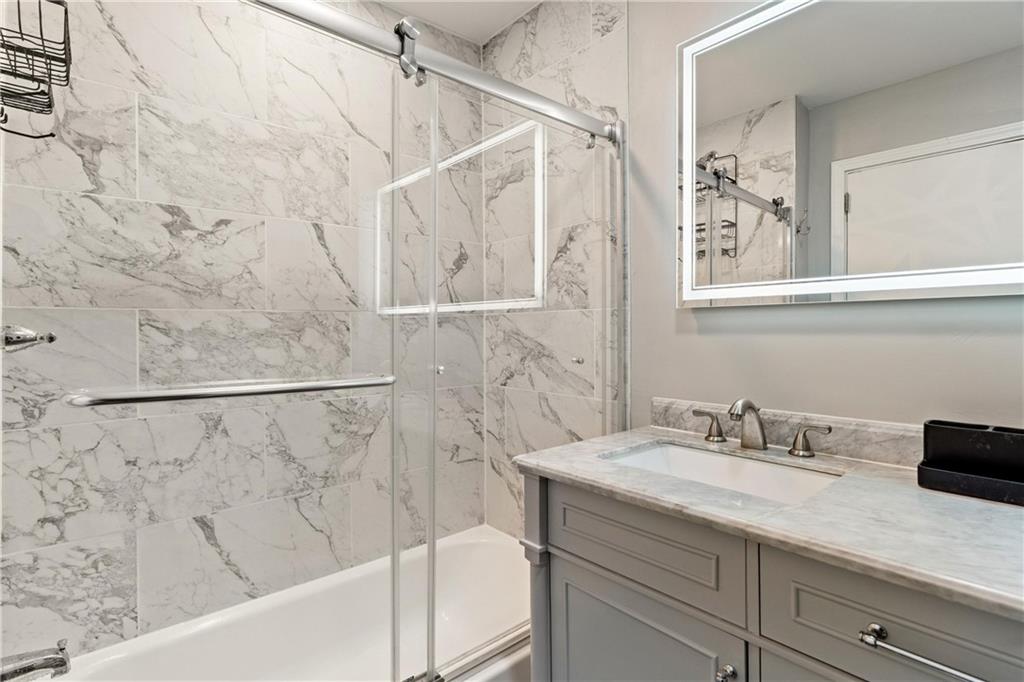 31 Harrison Street Pittsburgh, PA 15205 - Photo 18 of 32 a bathroom with a sink and a bathtub