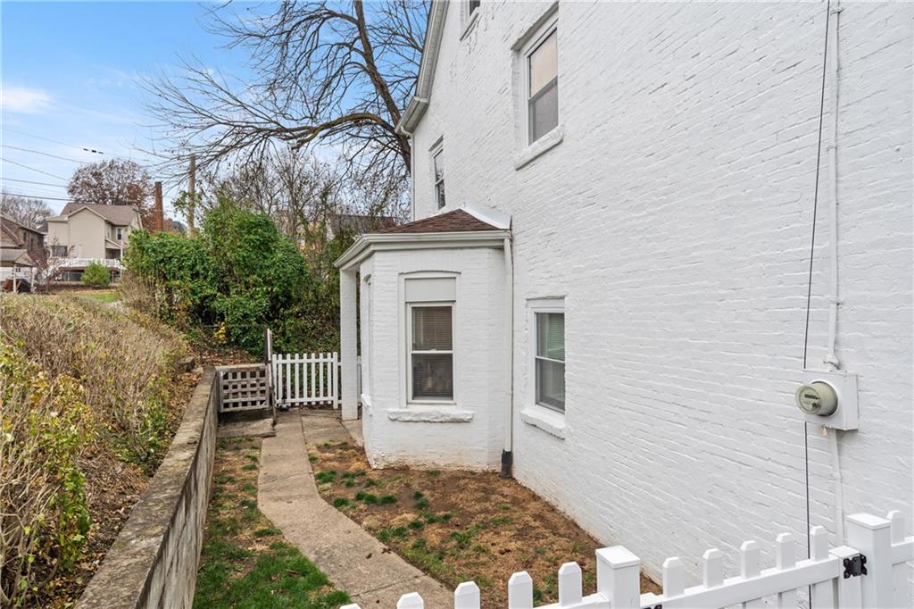 31 Harrison Street Pittsburgh, PA 15205 - Photo 24 of 32 a front view of a house with a yard