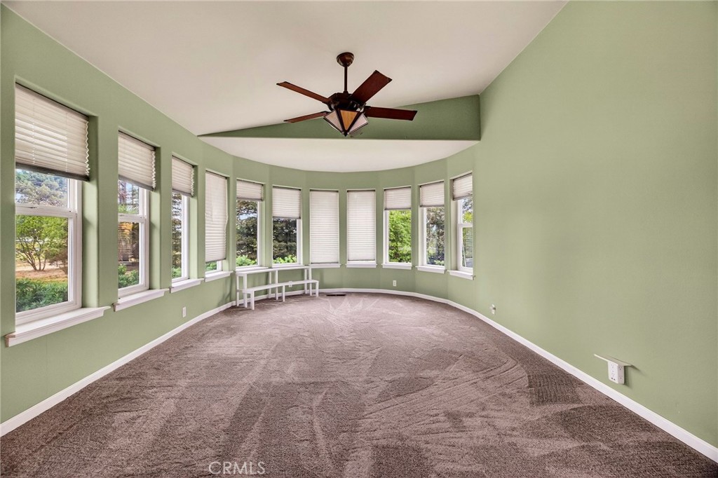 3770 Hall Road Corning, CA 96021 - Photo 10 of 64 a view of a livingroom with a ceiling fan and window