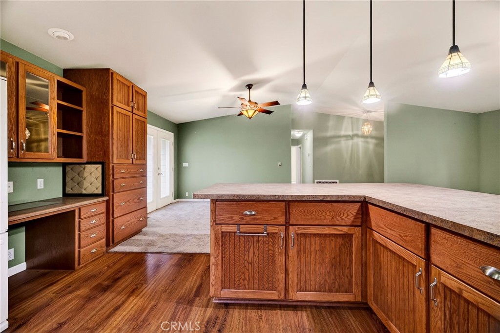3770 Hall Road Corning, CA 96021 - Photo 18 of 64 a view of a room with wooden floor and staircase