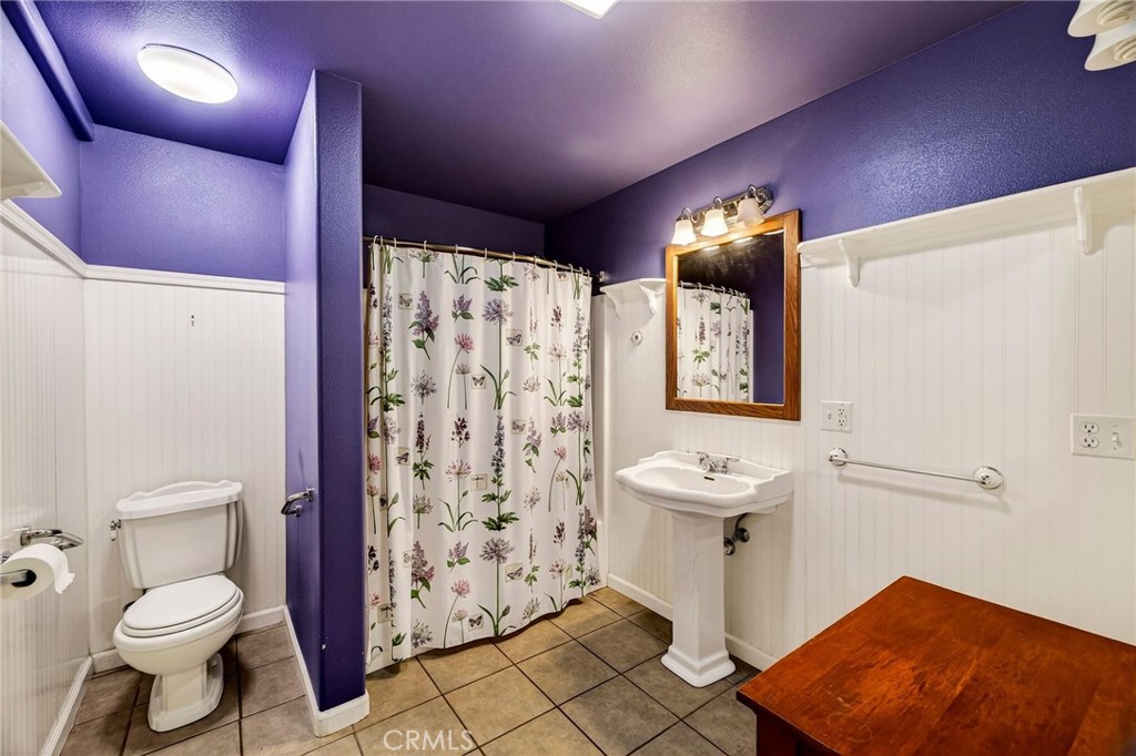 3770 Hall Road Corning, CA 96021 - Photo 25 of 64 a bathroom with a sink toilet and shower