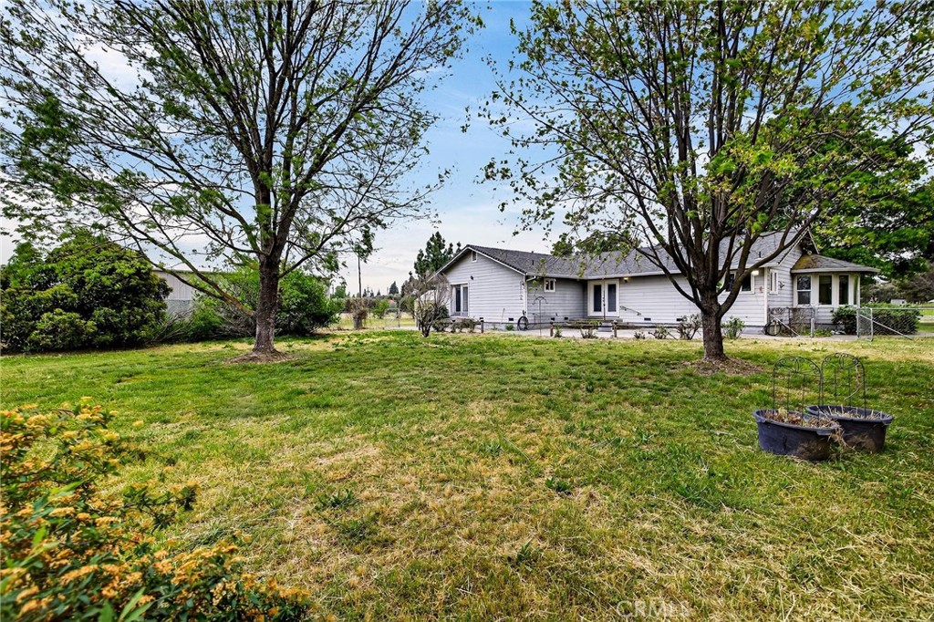 3770 Hall Road Corning, CA 96021 - Photo 41 of 64 a front view of house with yard and green space