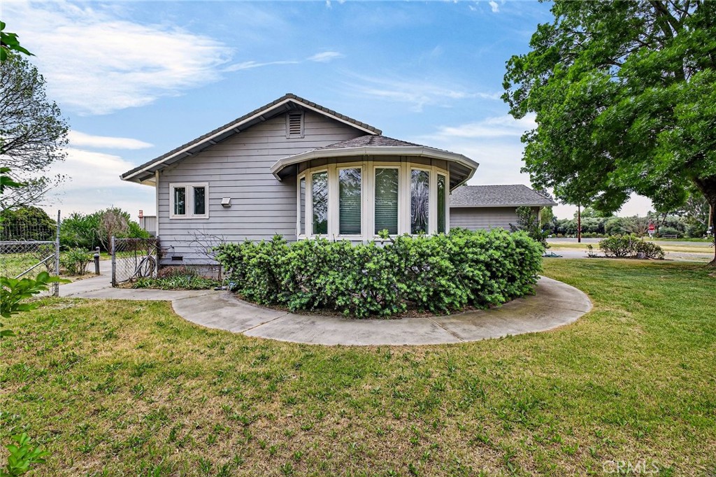 3770 Hall Road Corning, CA 96021 - Photo 42 of 64 a front view of a house with a yard