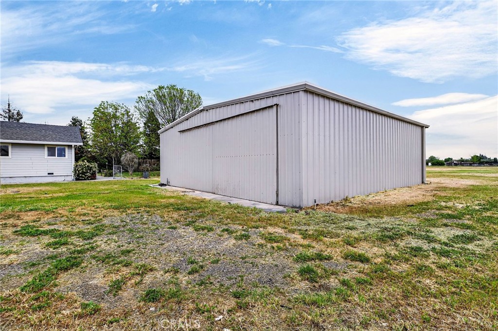 3770 Hall Road Corning, CA 96021 - Photo 52 of 64 a view of a house with backyard