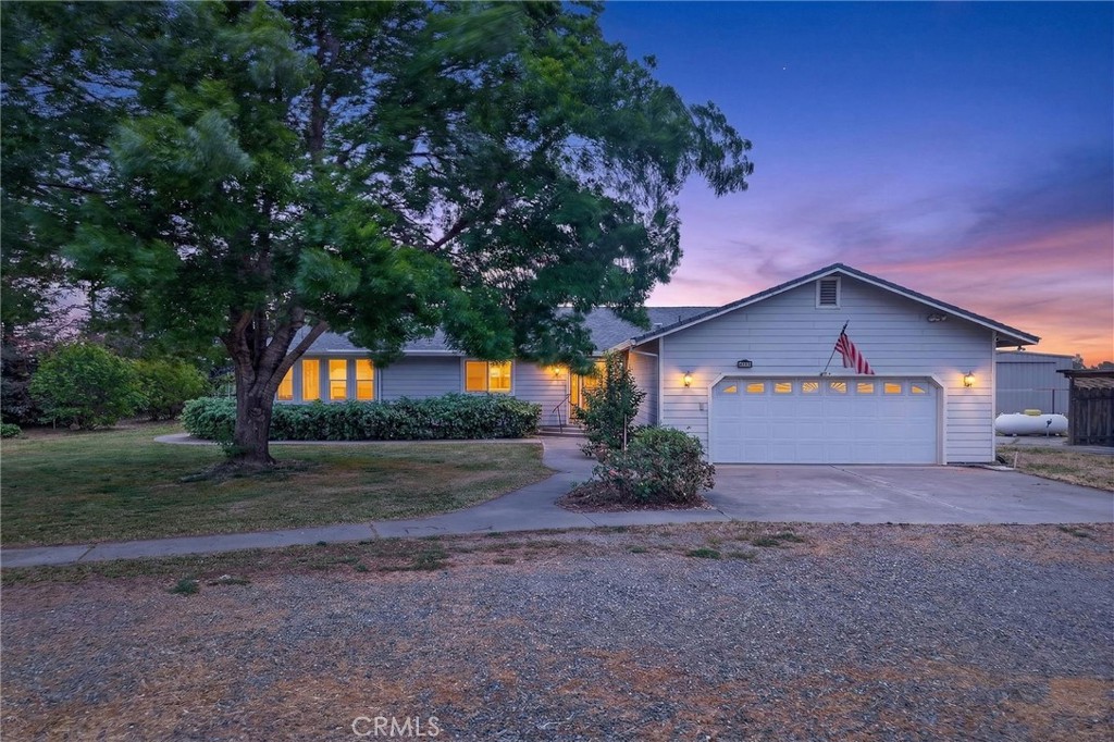 3770 Hall Road Corning, CA 96021 - Photo 61 of 64 a front view of house with yard and trees in the background
