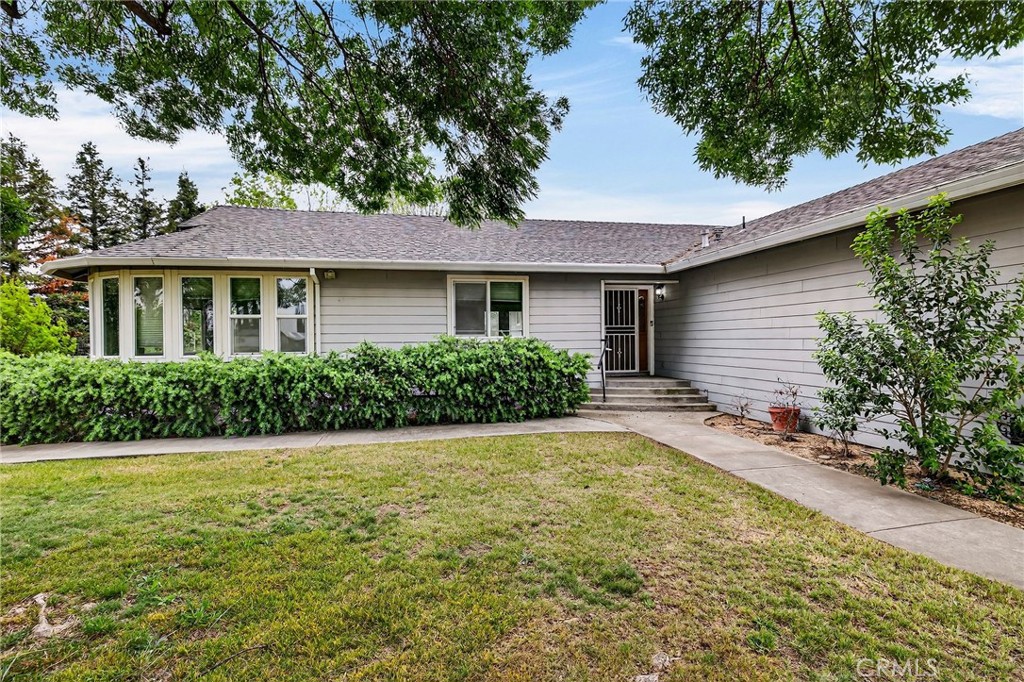 3770 Hall Road Corning, CA 96021 - Photo 8 of 64 a front view of a house with a yard