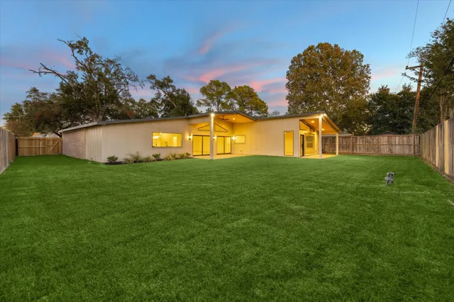 a view of a house with a swimming pool