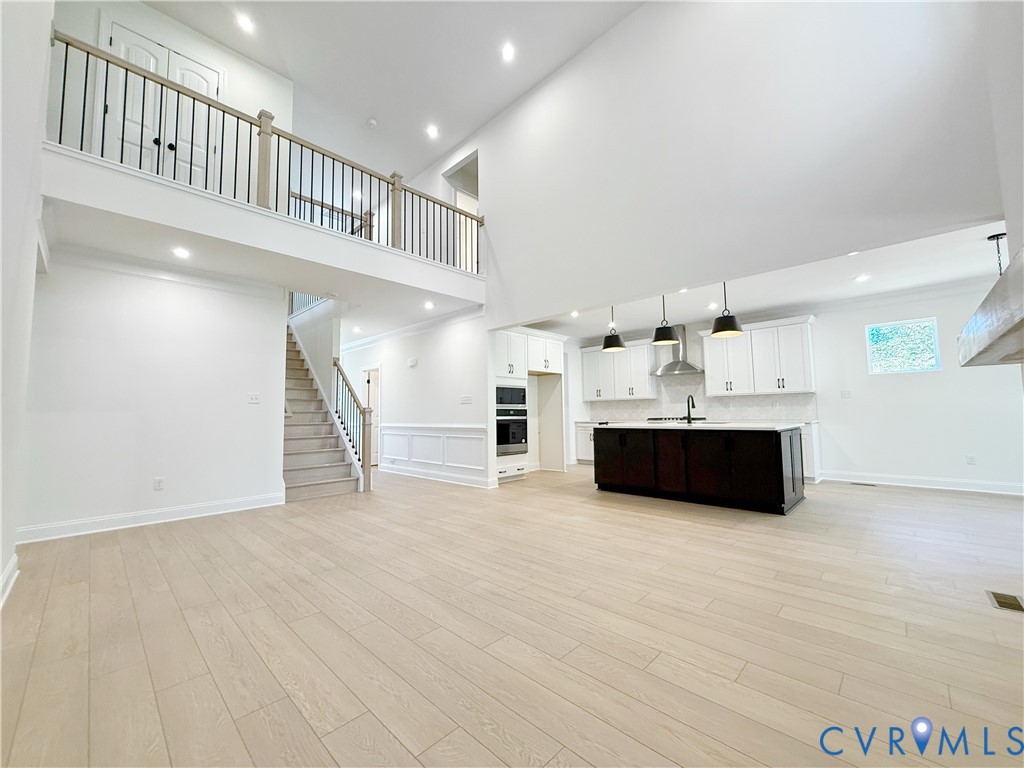 8130 Clancy Court Chesterfield, VA 23838 - Photo 10 of 36 A two-story family room with gas fireplace is perf