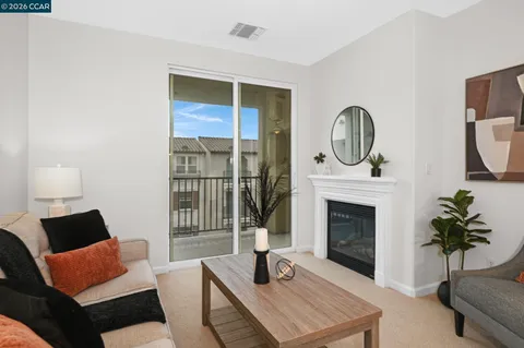 a front view of a house with wooden fence