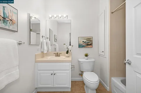 a bathroom with a white tub