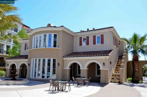 a outdoor living space with furniture and a large window