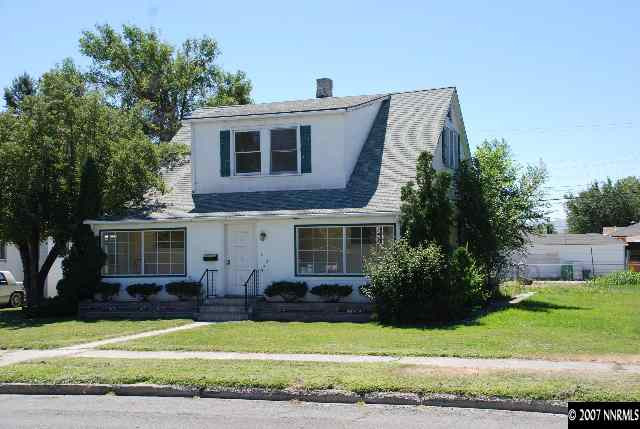 210 Wonder Street Reno, NV 89502 - Photo 1 of 7 a view of a house with a yard and plants