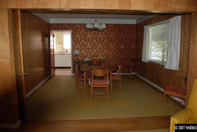 210 Wonder Street Reno, NV 89502 - Photo 4 of 7 a dining room with furniture and window
