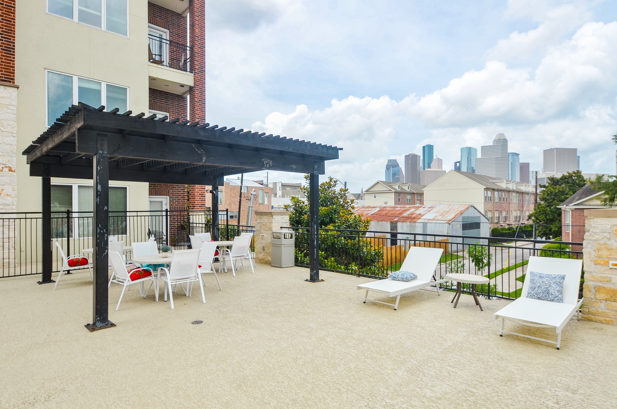 1900 Genesee Street, Unit 104 Houston, TX 77006 - Photo 32 of 36 Cabana and downtown view from the rooftop pool.