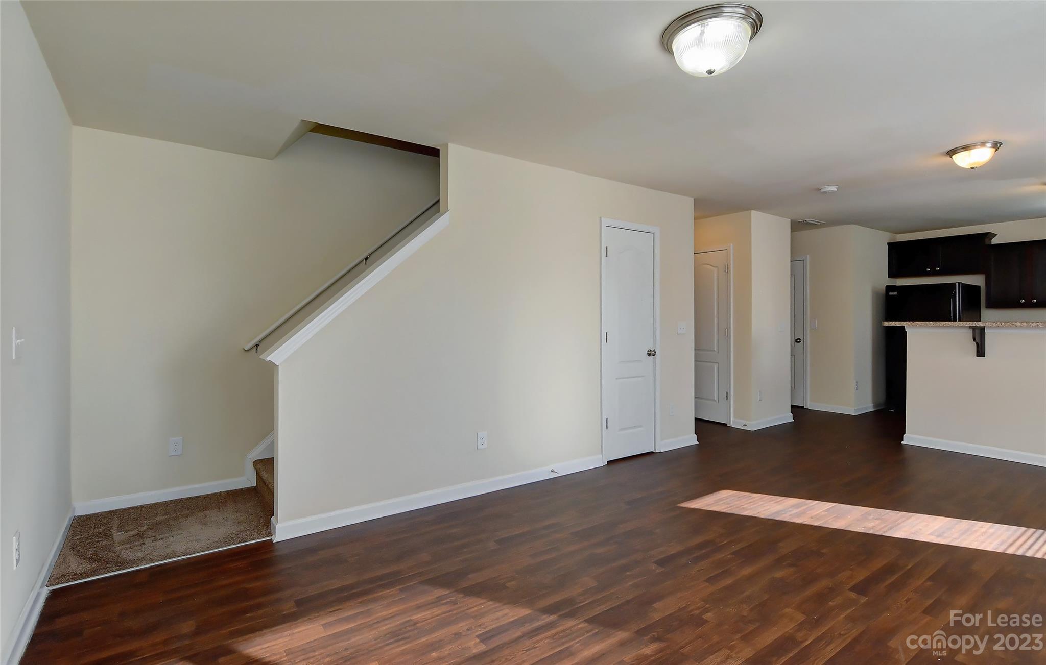 2010 Turtle Point Road Charlotte, NC 28262 - Photo 18 of 39 a view of a livingroom with wooden floor