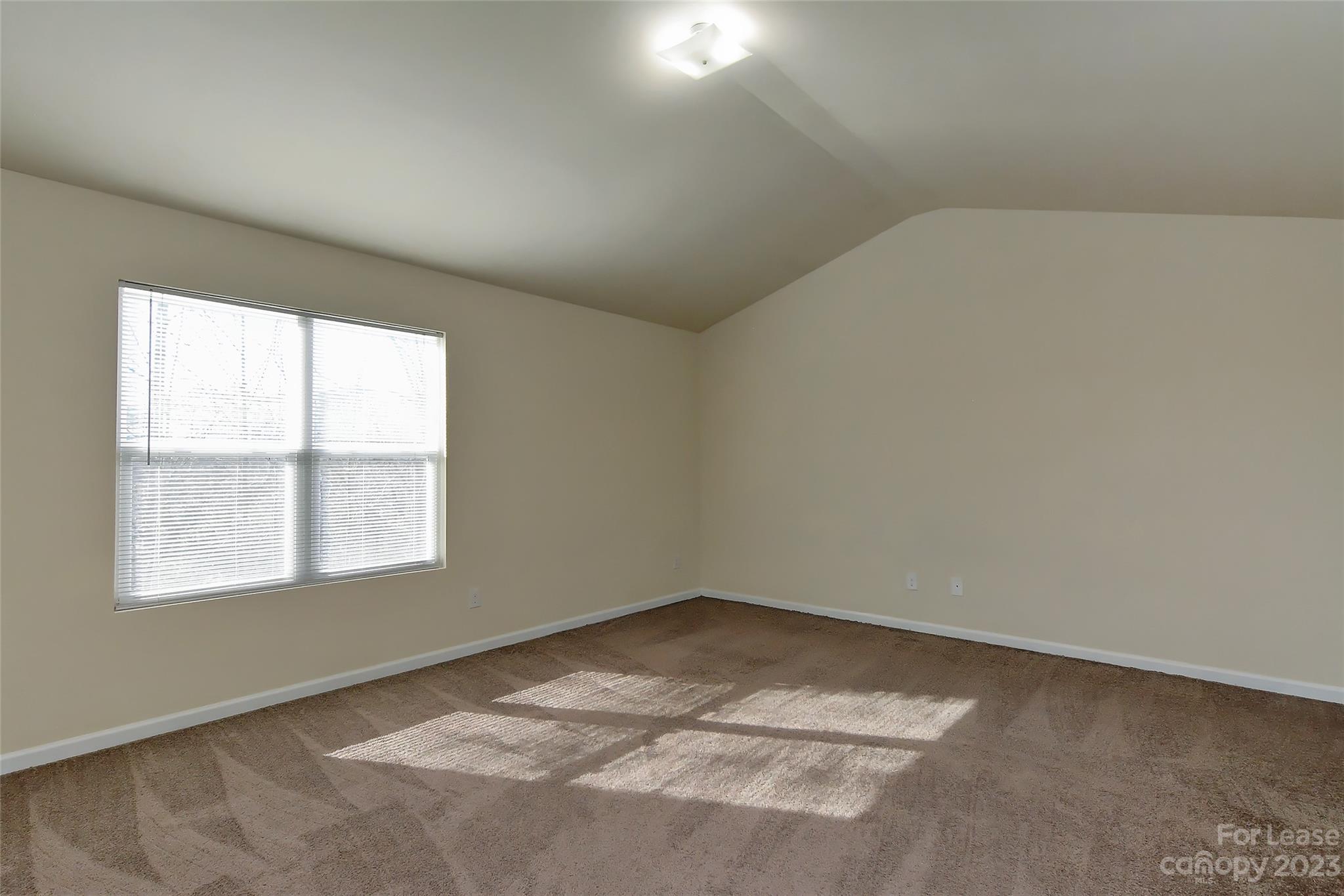 2010 Turtle Point Road Charlotte, NC 28262 - Photo 21 of 39 an empty room with a window