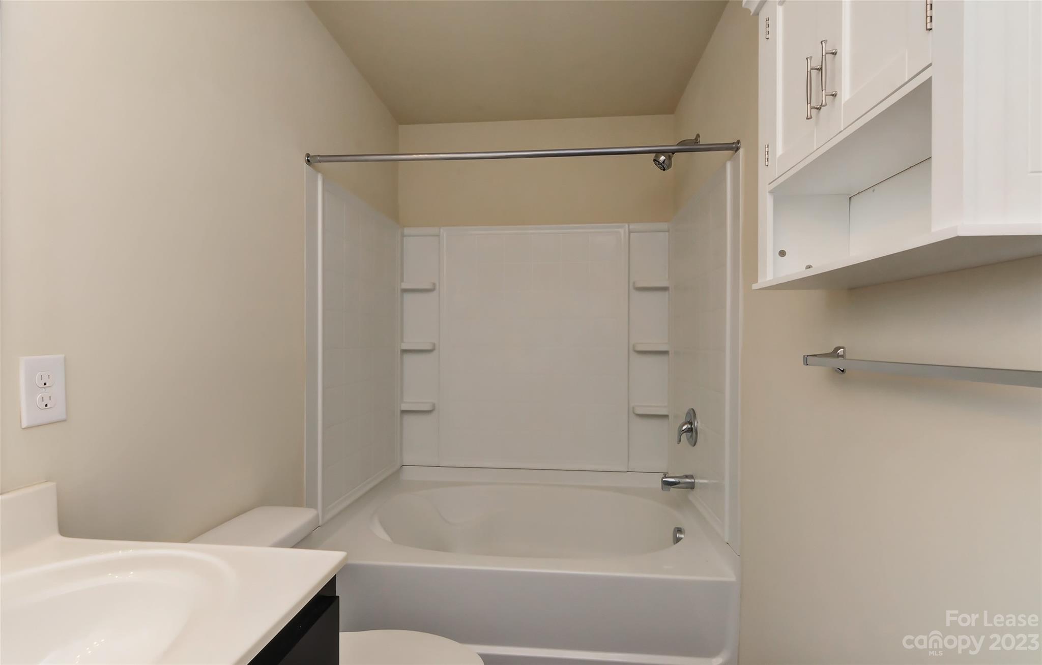 2010 Turtle Point Road Charlotte, NC 28262 - Photo 26 of 39 a bathroom with a shower and a bath tub