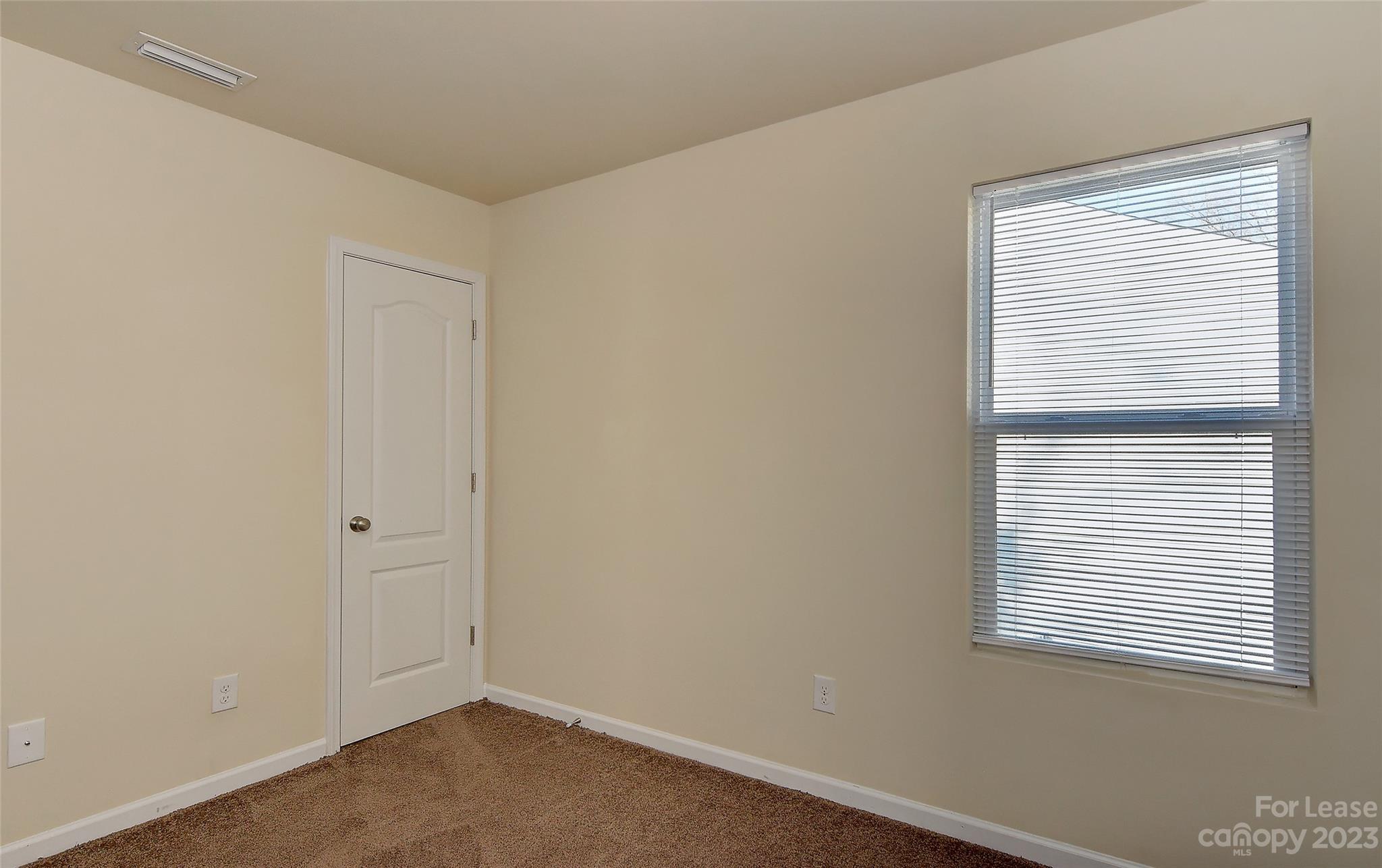 2010 Turtle Point Road Charlotte, NC 28262 - Photo 27 of 39 a view of an empty room with a window
