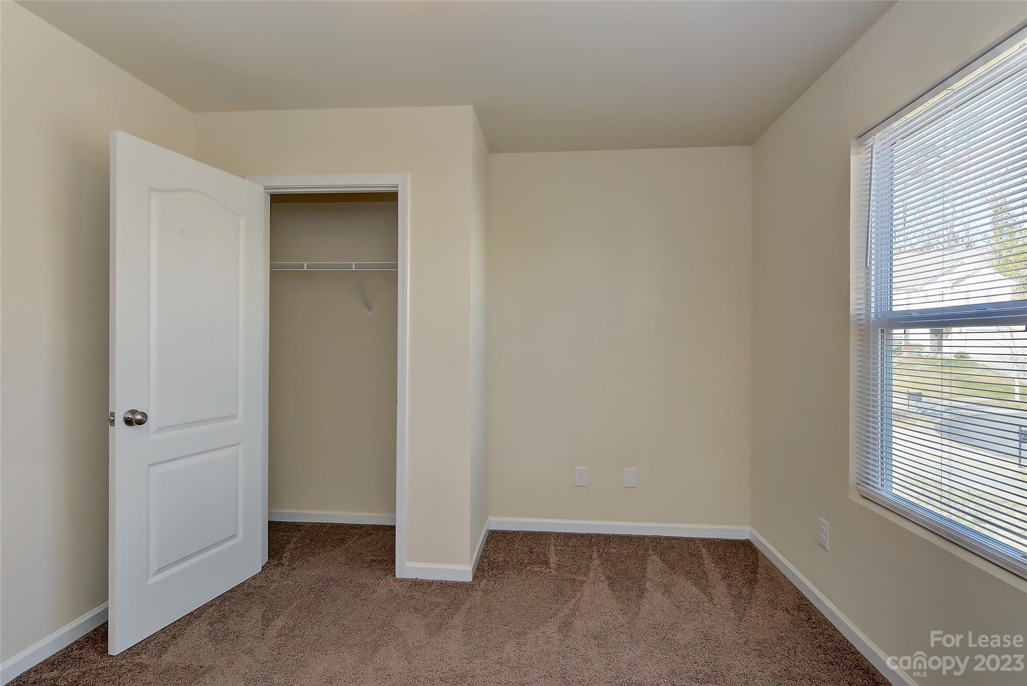 2010 Turtle Point Road Charlotte, NC 28262 - Photo 30 of 39 an empty room that has a window
