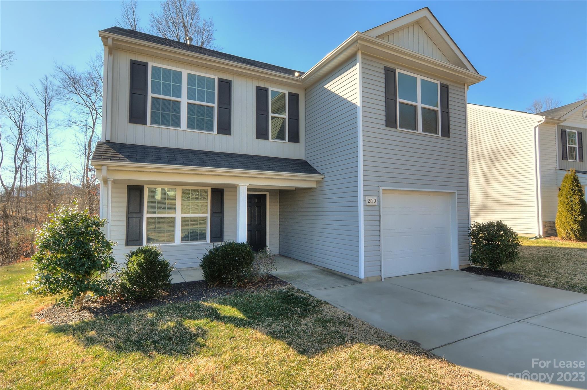 2010 Turtle Point Road Charlotte, NC 28262 - Photo 3 of 39 a front view of a house with garden