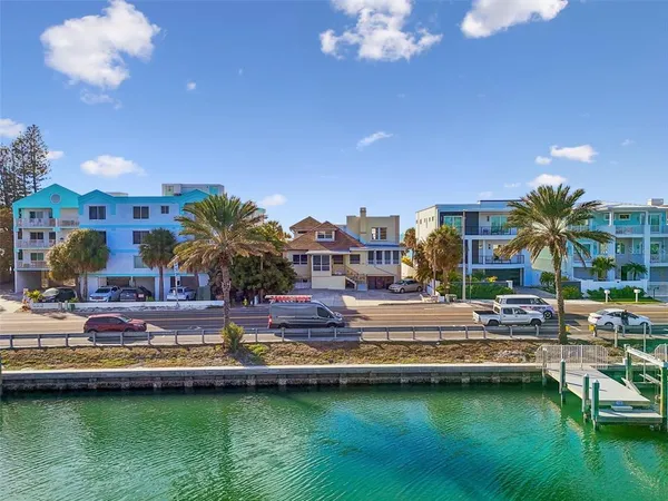 a view of a swimming pool and lounge chair