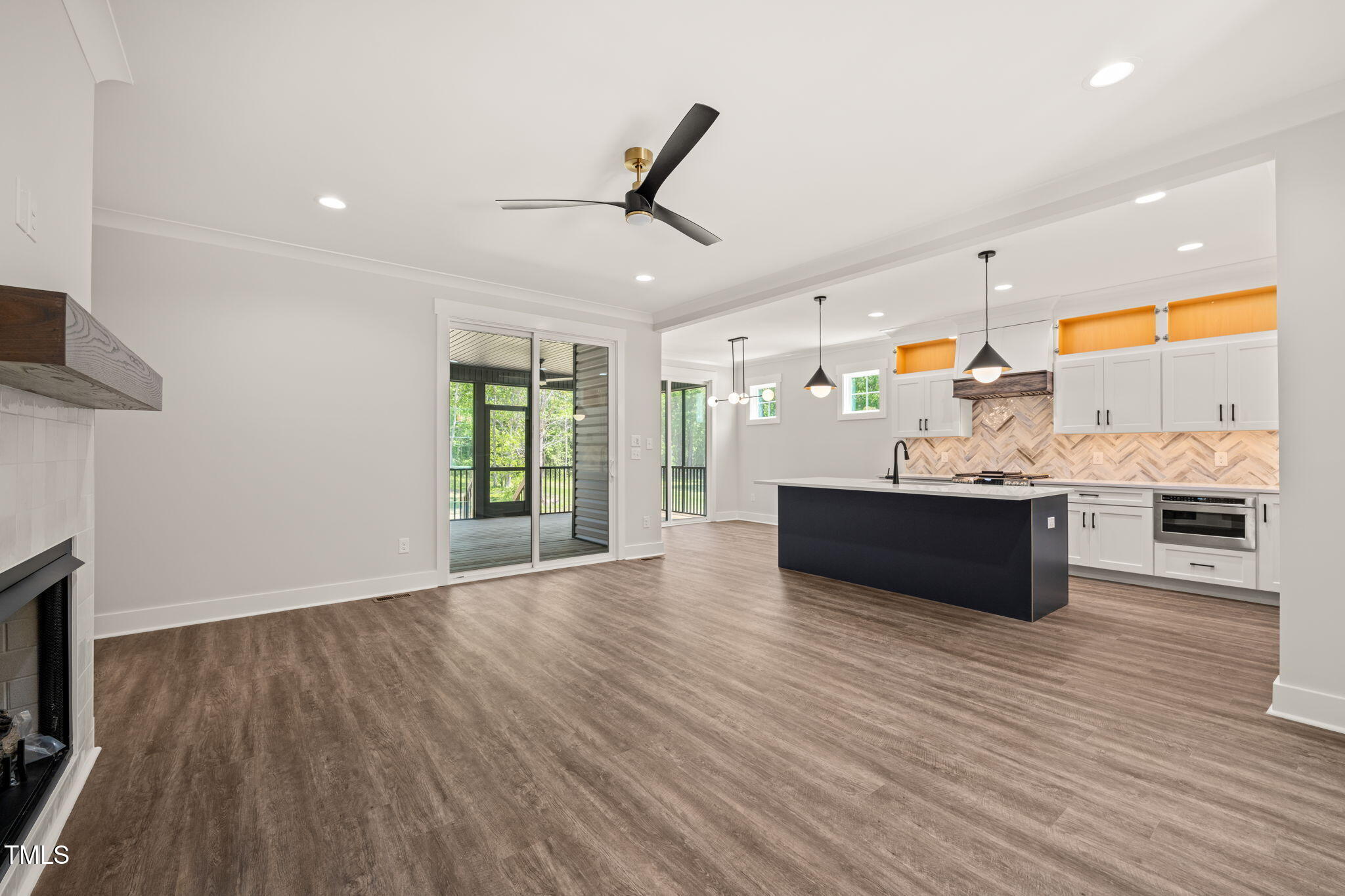 320 Pilot Ridge Road Zebulon, NC 27597 - Photo 16 of 49 a view of kitchen with cabinets and wooden floor