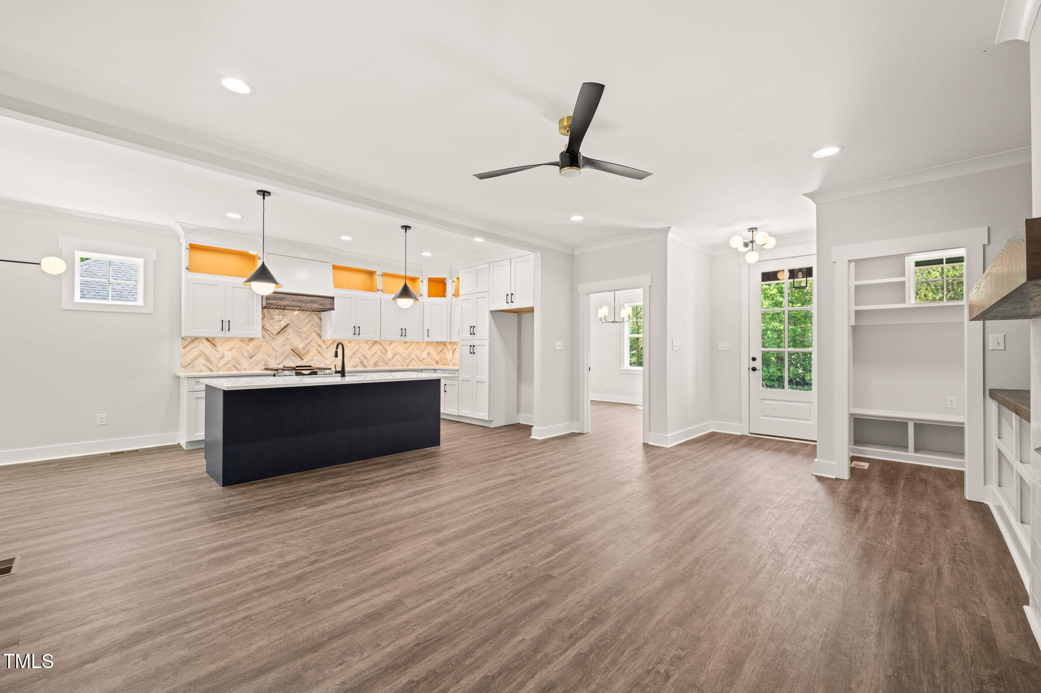 320 Pilot Ridge Road Zebulon, NC 27597 - Photo 17 of 49 a view of a room with wooden floor cabinet and windows
