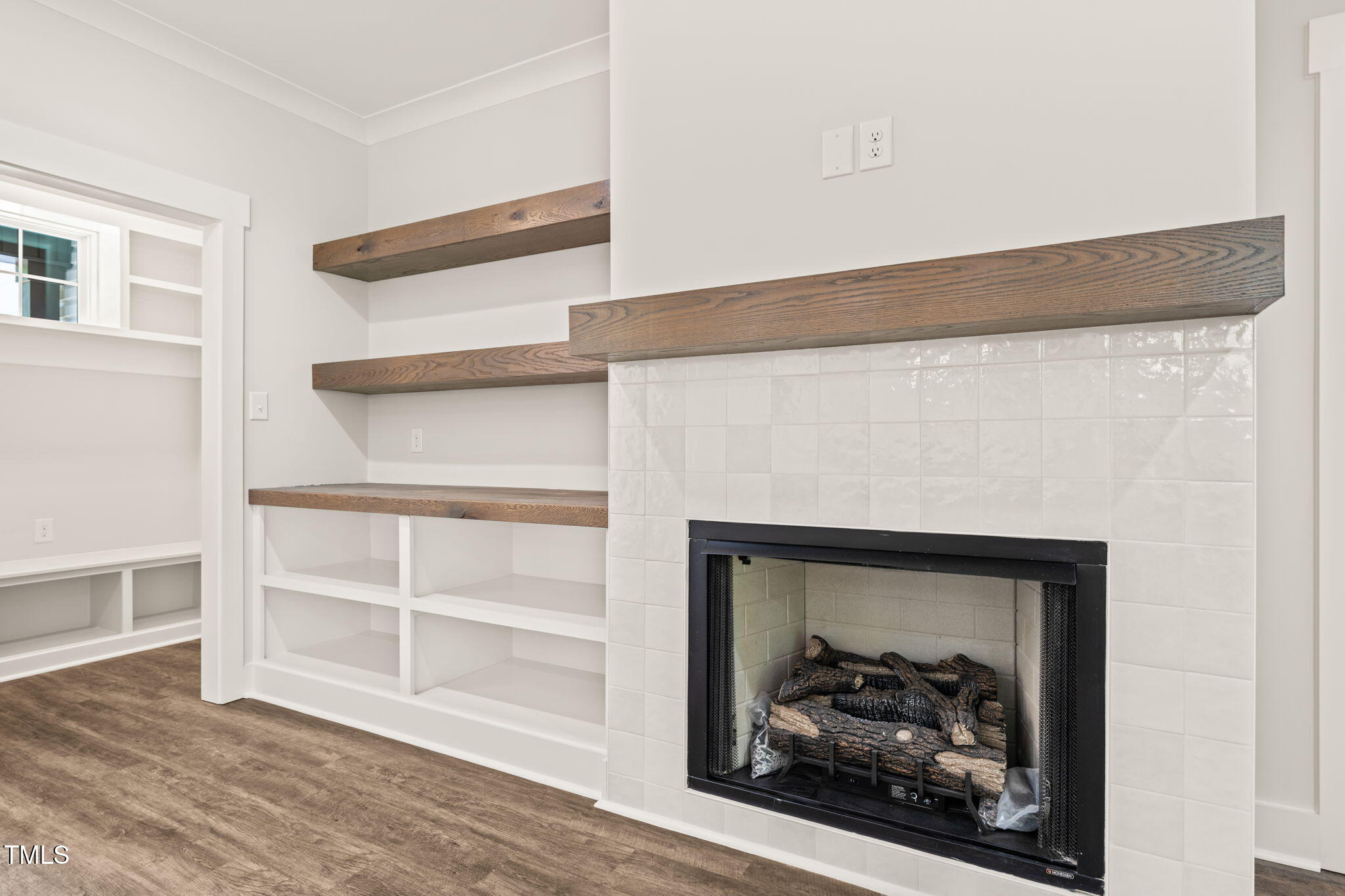 320 Pilot Ridge Road Zebulon, NC 27597 - Photo 18 of 49 a living room with a fireplace