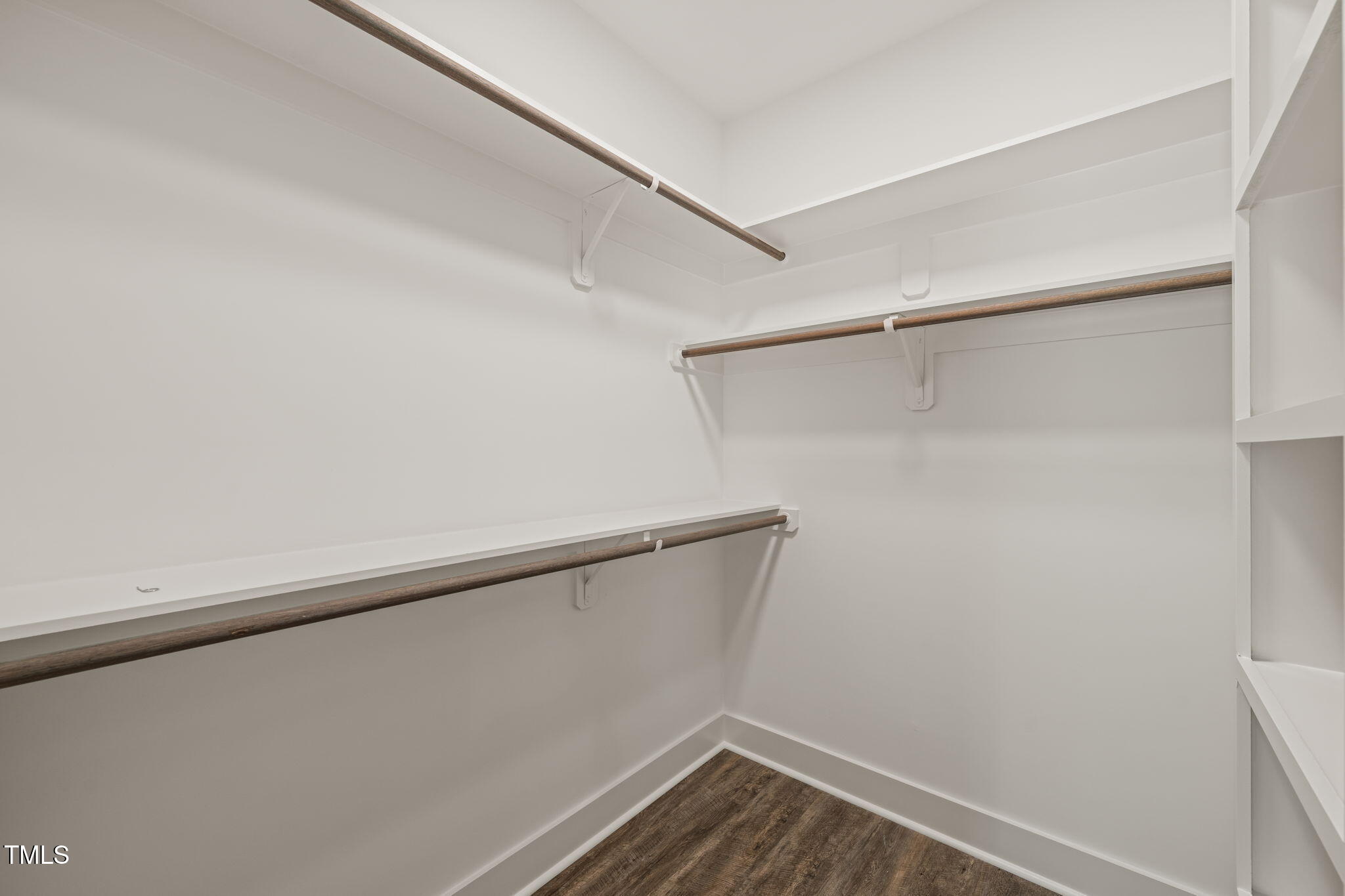 320 Pilot Ridge Road Zebulon, NC 27597 - Photo 23 of 49 a view of an empty walk in closet