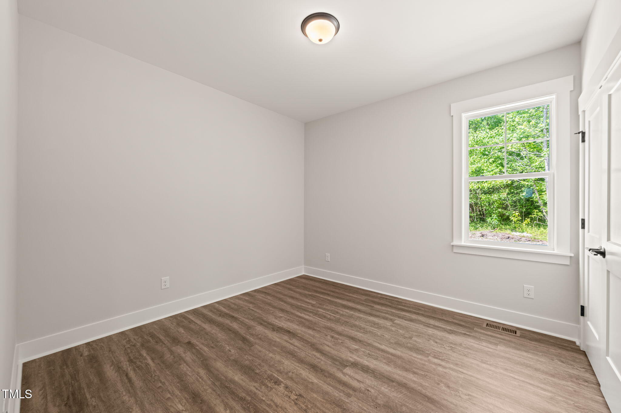 320 Pilot Ridge Road Zebulon, NC 27597 - Photo 25 of 49 an empty room with a window