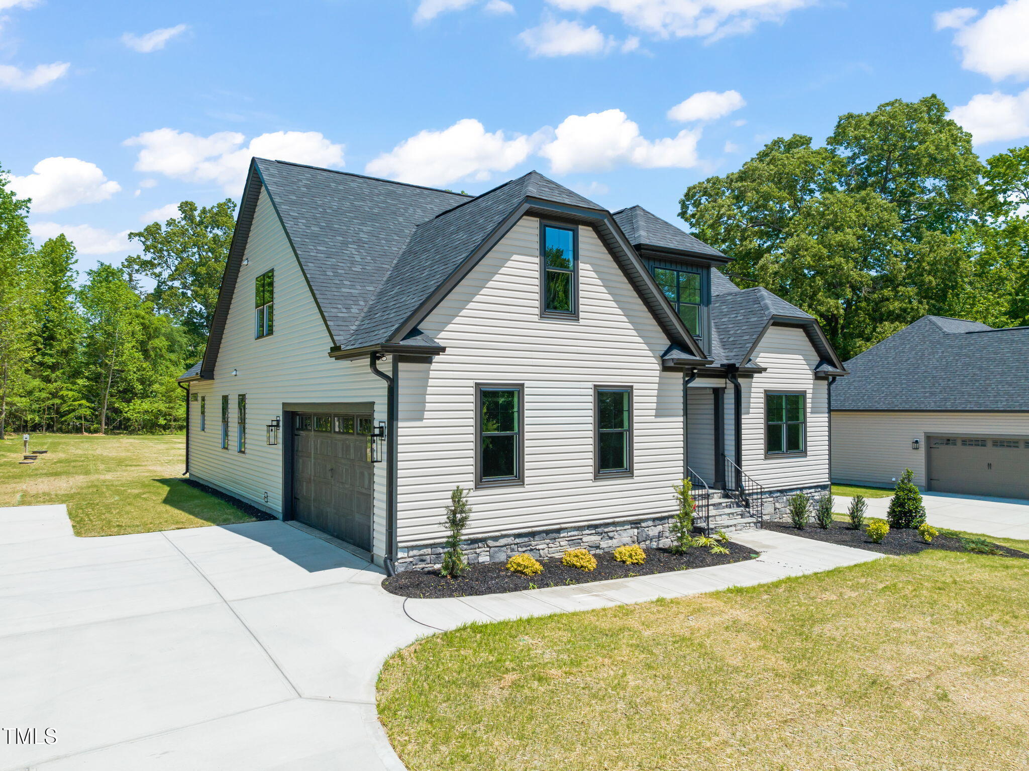 320 Pilot Ridge Road Zebulon, NC 27597 - Photo 3 of 49 a house view with a outdoor space