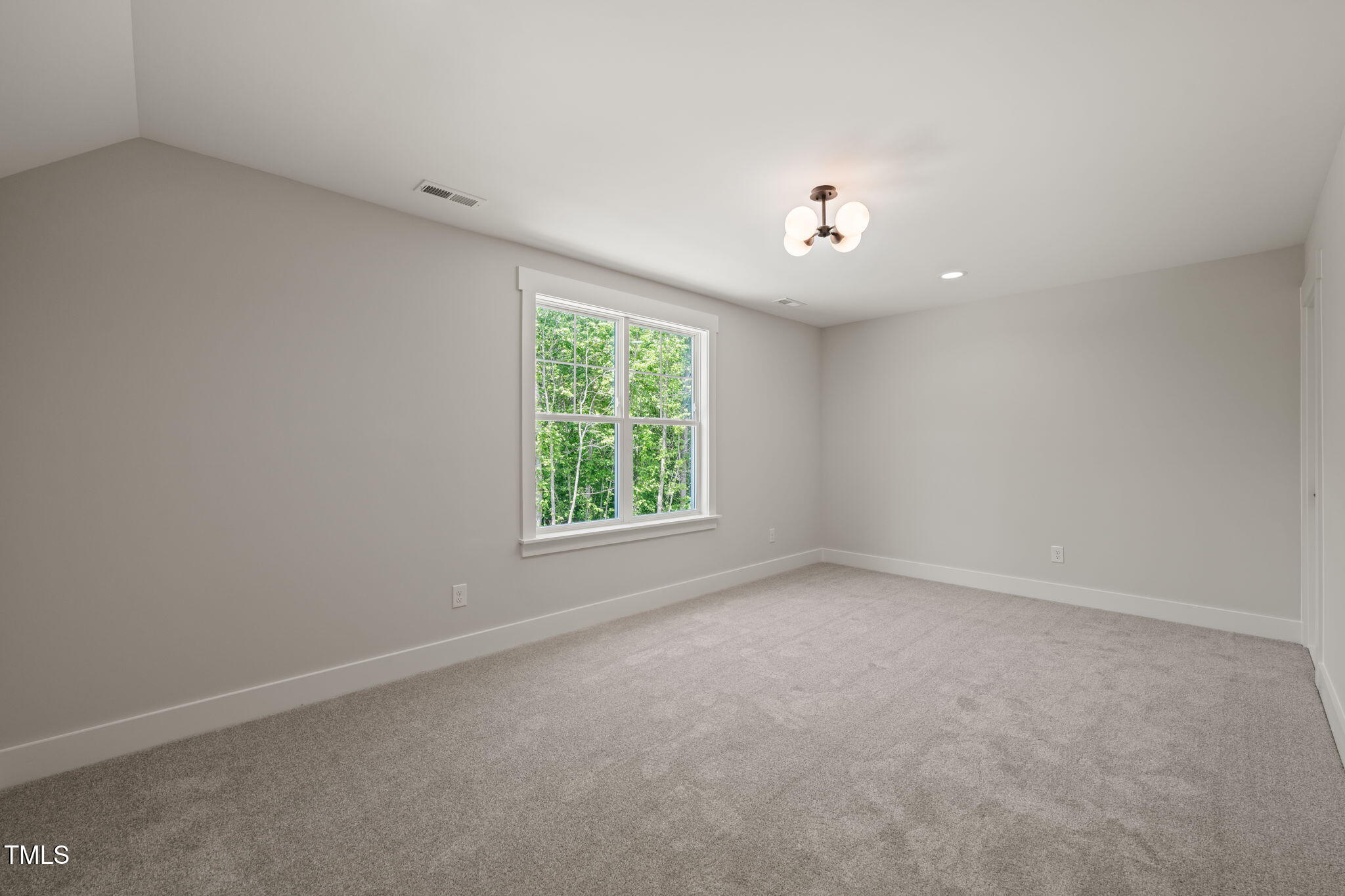 320 Pilot Ridge Road Zebulon, NC 27597 - Photo 32 of 49 an empty room with a window