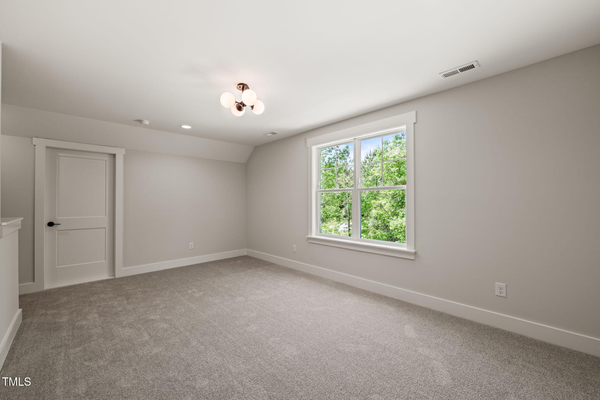 320 Pilot Ridge Road Zebulon, NC 27597 - Photo 33 of 49 an empty room with a window