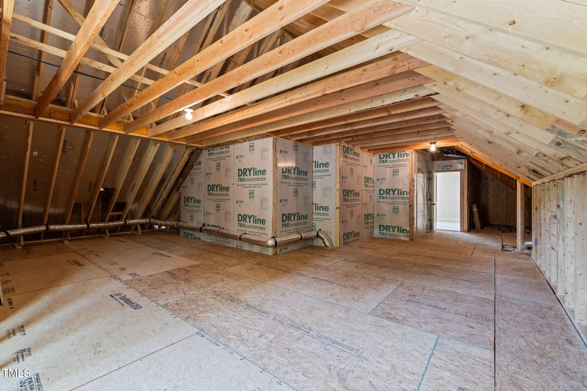 320 Pilot Ridge Road Zebulon, NC 27597 - Photo 39 of 49 a view of a room with wooden walls
