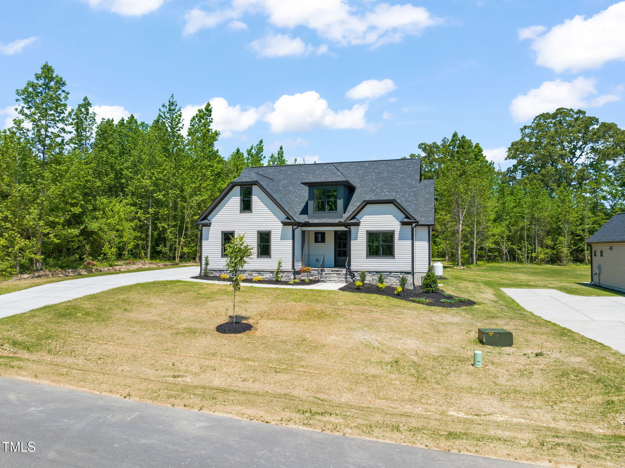 320 Pilot Ridge Road Zebulon, NC 27597 - Photo 43 of 49 a front view of house with swimming pool and green space