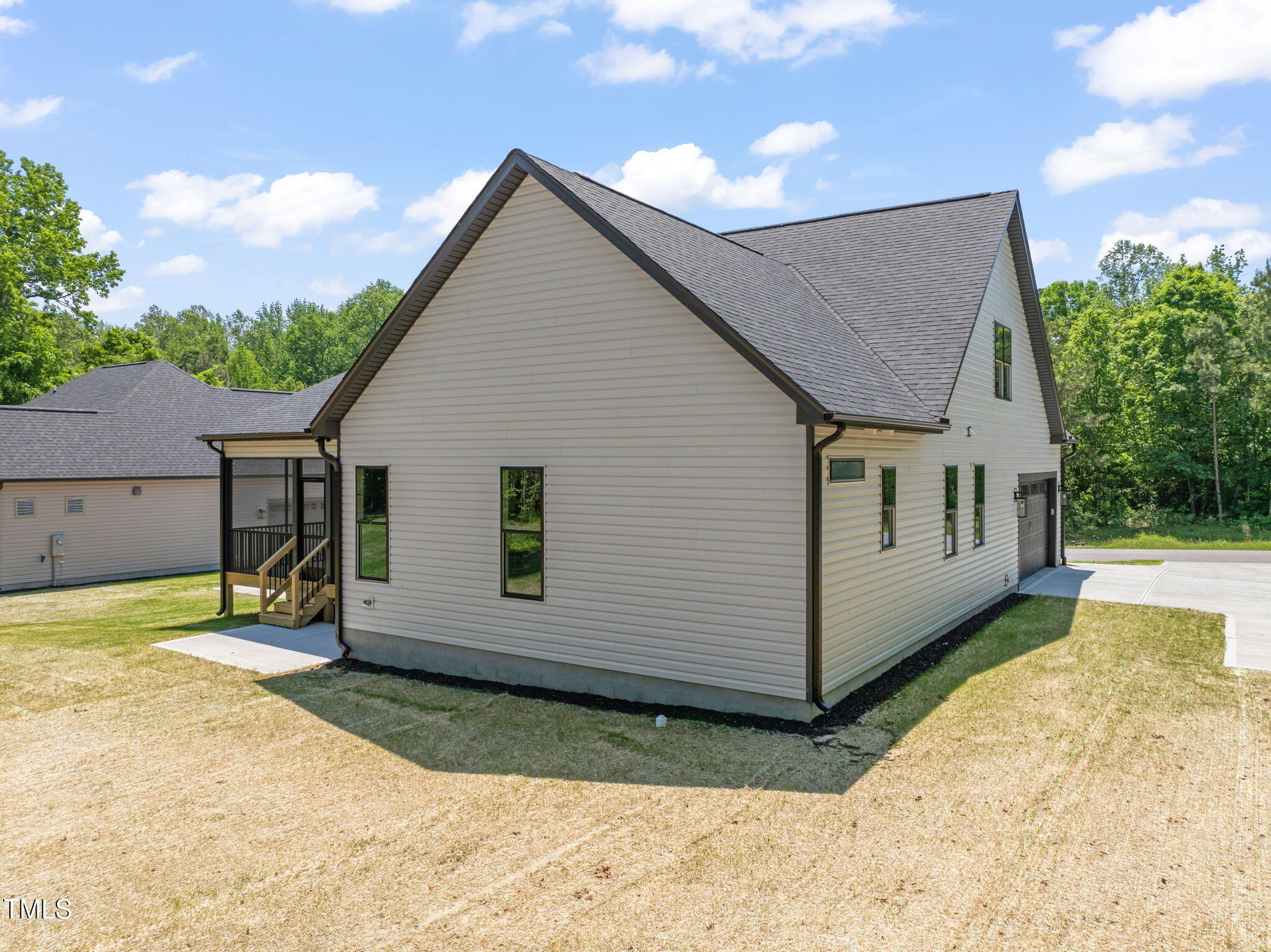 320 Pilot Ridge Road Zebulon, NC 27597 - Photo 48 of 49 a view of a house with a yard