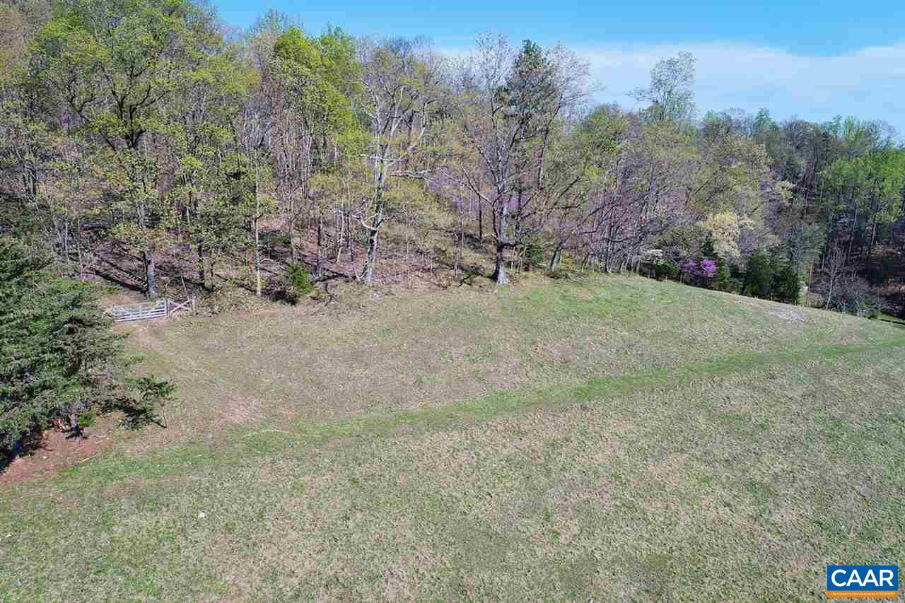 Ruth Road Madison, VA 22727 - Photo 11 of 26 a view of a field with trees in the background