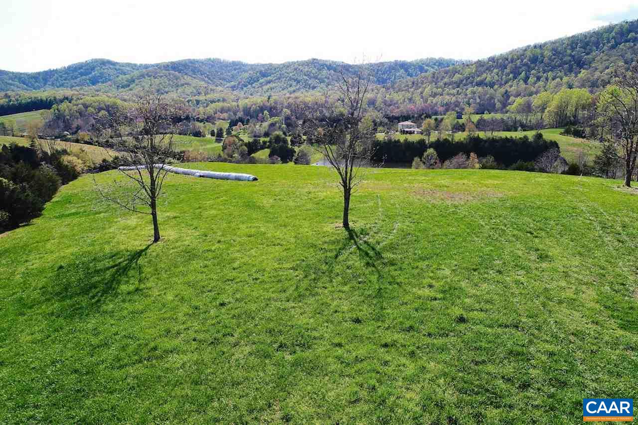 Ruth Road Madison, VA 22727 - Photo 8 of 26 a view of a lush green field with mountains in the background