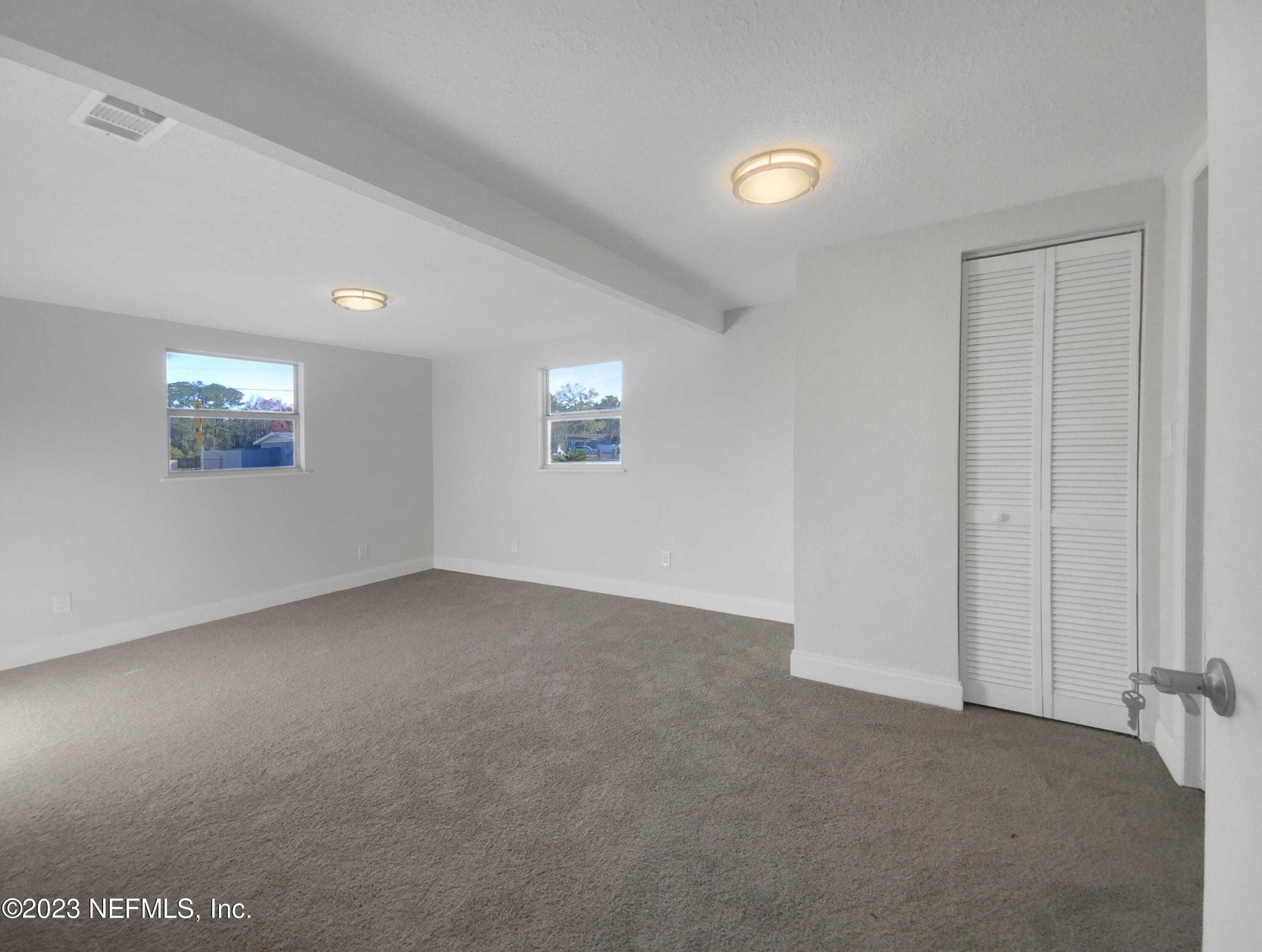4204 Clyde Drive Jacksonville, FL 32208 - Photo 14 of 20 a view of an empty room with a window