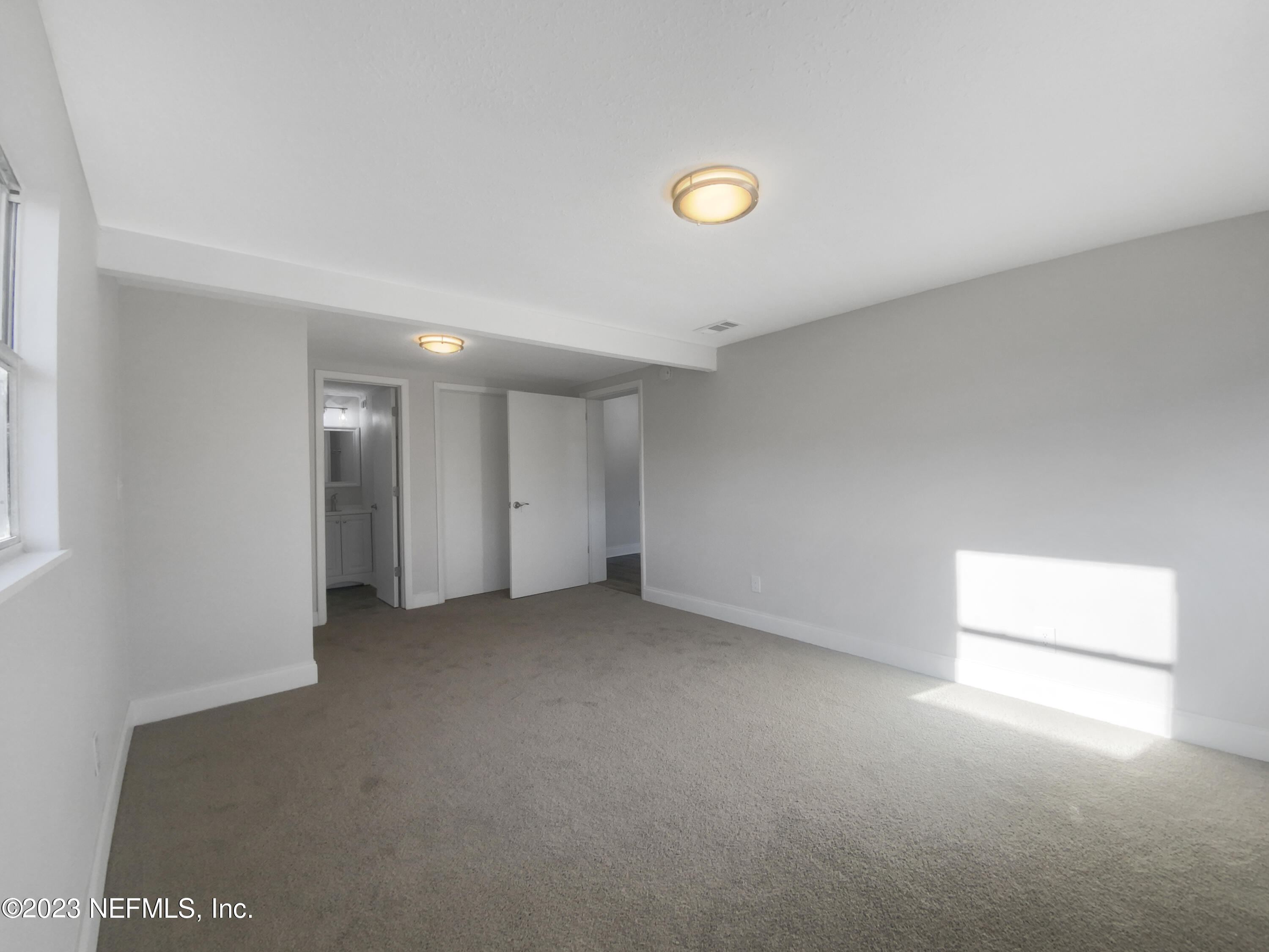 4204 Clyde Drive Jacksonville, FL 32208 - Photo 15 of 20 an empty room with an entryway