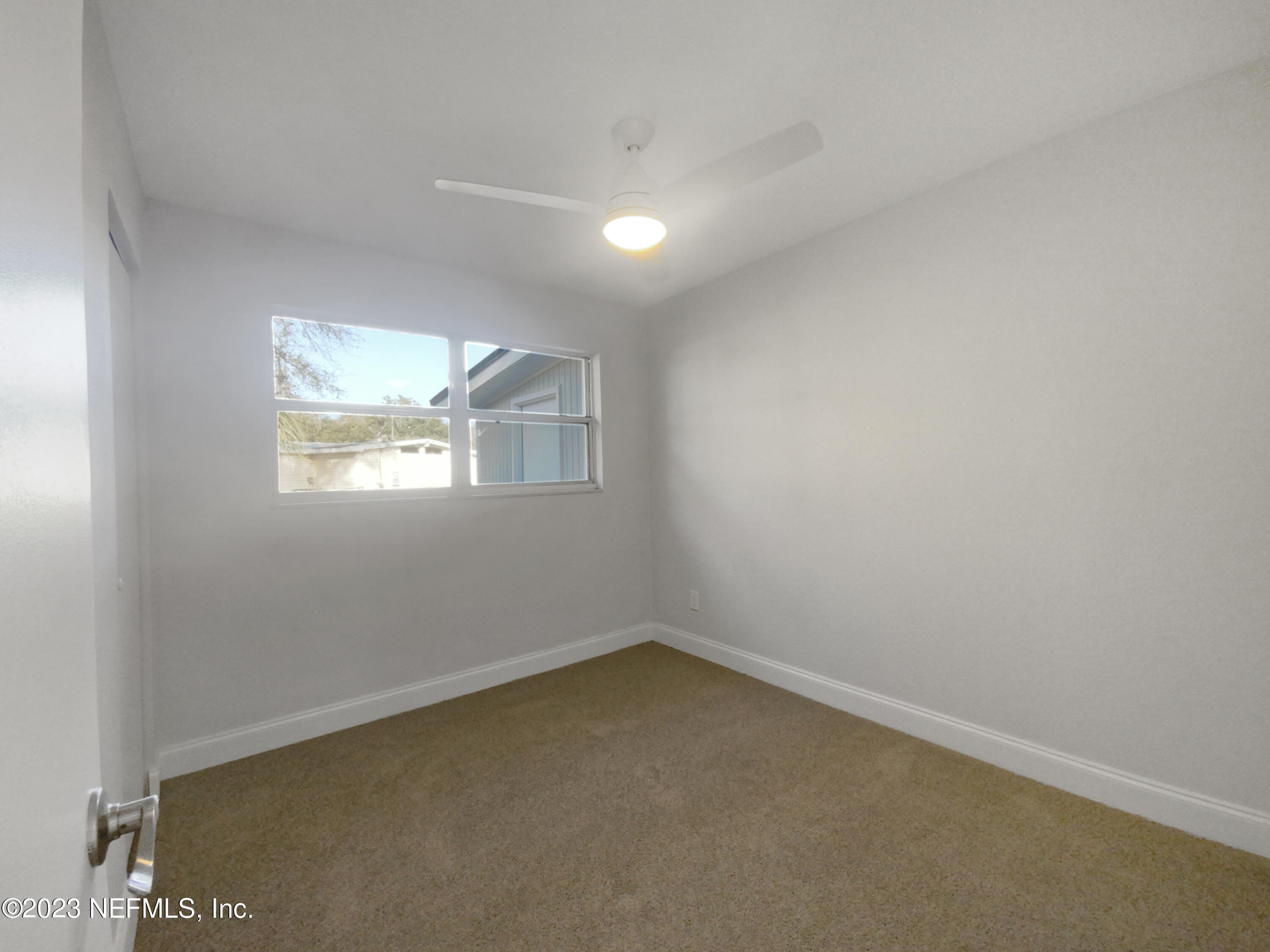 4204 Clyde Drive Jacksonville, FL 32208 - Photo 19 of 20 an empty room with windows