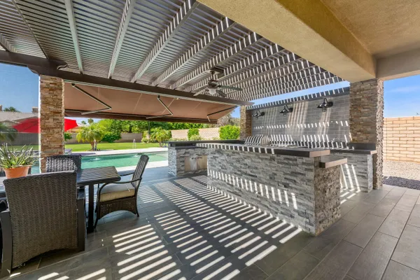 a bathroom with a double vanity sink and mirror